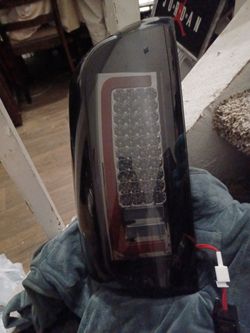 Red Bar LED Tail Lights; Black Housing; Clear Lens
(14-18 Sierra 1500 w/ Factory Halogen Tail Left/ Drivers Side Left Side