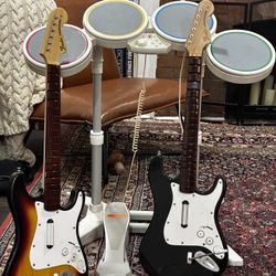 Nintendo Wii Rockband Drum Set and guitars
