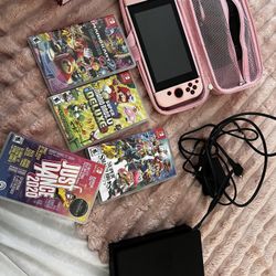NINTENDO SWITCH WITH 4 GAMES