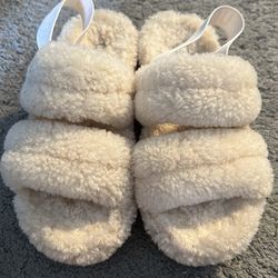 Ugg women’s sheep’s wool slippers
