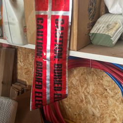 Caution Buried Electrical Line Below. 50+ Feet  