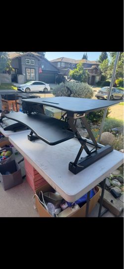 black height-adjustable standing desk