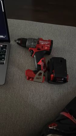 Milwaukee Hammer Drill And Battery 