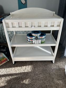Changing table and diaper genie