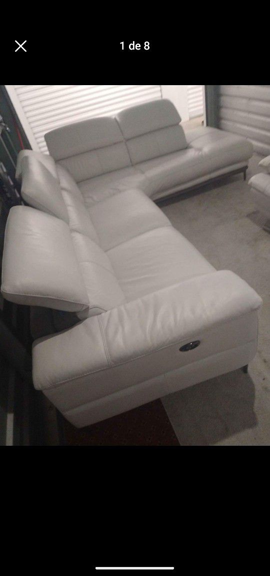 SECTIONAL GENUINE LEATHER RECLINER ELECTRIC BLACK COLOR..DELIVERY SERVICE AVAILABLE ..