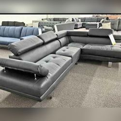 Black faux leather Right and left hand facing sectional sofa