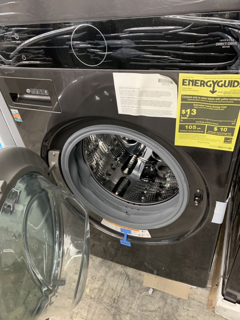 New LG Black Stainless Steel Stacked Washer And Dryer Gas With Steam