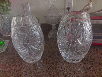 Crystal vases very heavy etched, one hundred dollars each