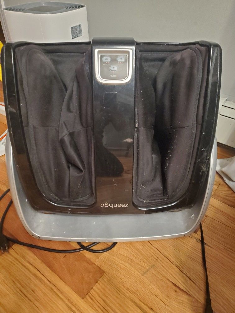 Brookstone Usqueez Foot Massager