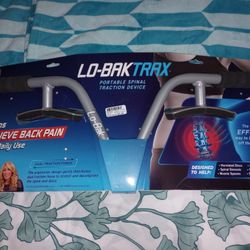 LO-BAK TRAX  EXCERCISER THAT DECOMPRESSES YOUR SPINE W/DVD NEW CONDITION $5.00 CASH.