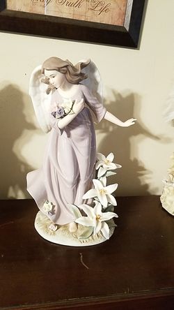 Members mark porcelain angel
