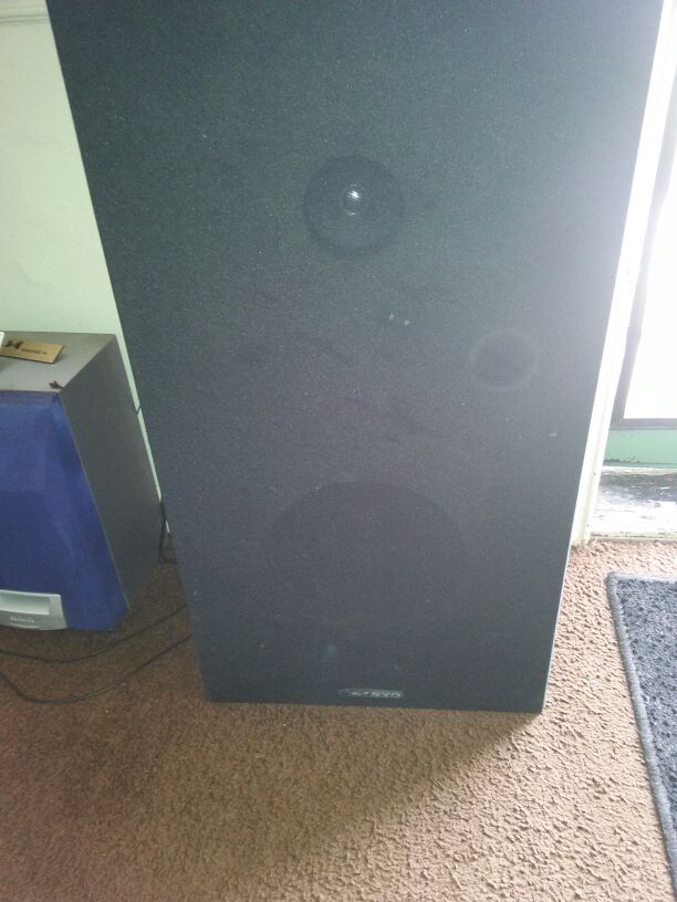 2 big speakers one small and a subwoofer