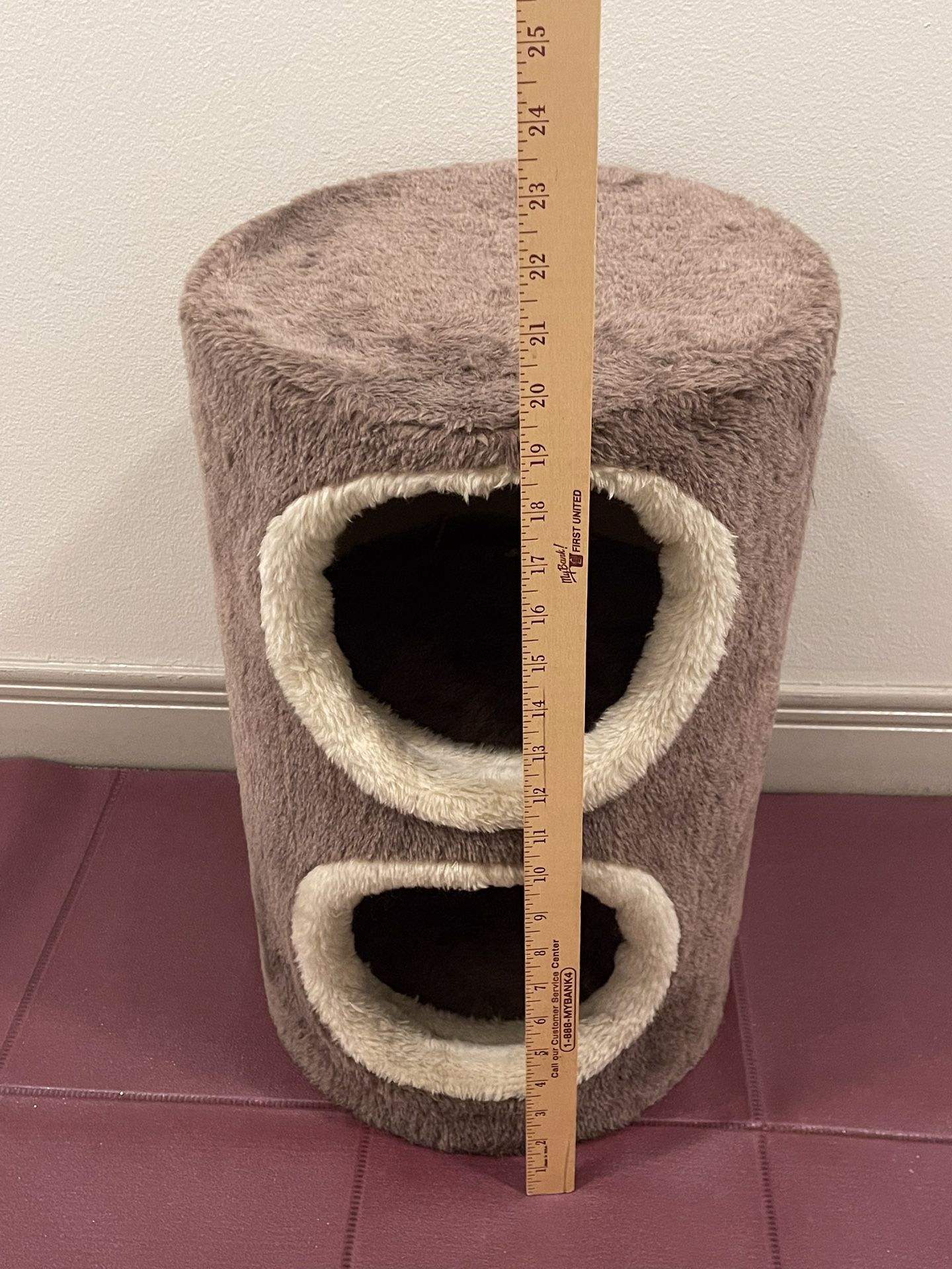 2-Story, Barrel-Shaped Brown KITTY CONDO - posted price is firm.