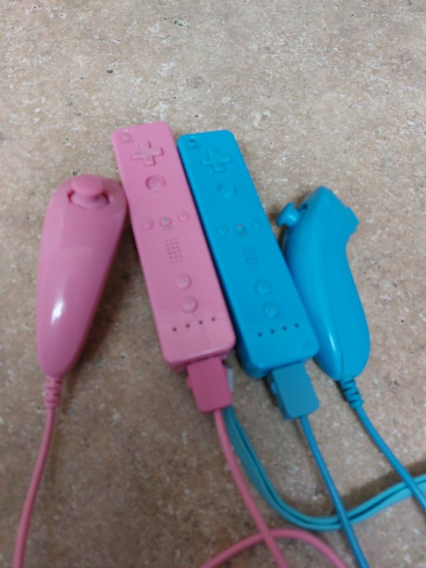 Wii Comtrollers Blue And Pink 50 Dollars For Both