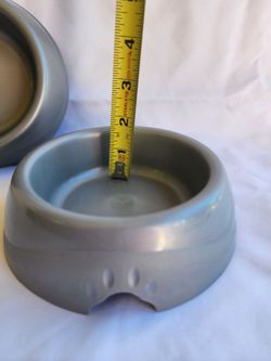 2 plastic gray dog food bowls