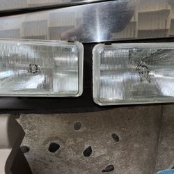 1(contact info removed) Cadillac Brougham Headlight Set
