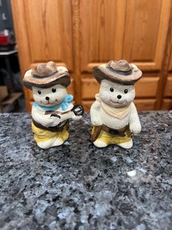 Vintage Ceramic Cowboy Bears Pair of Salt and Pepper Shakers. Size approximately 3 1/2 inches tall. Preowned with paint wear.