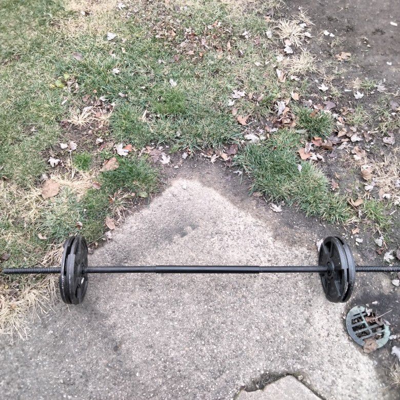STANDARD BARBELL WITH WEIDER WEIGHT PLATES