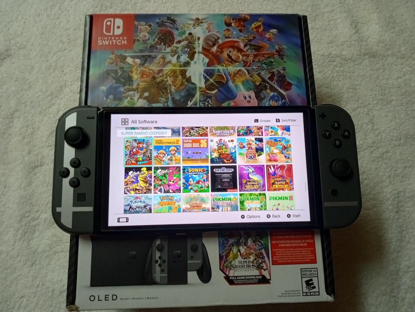 Nintendo Switch Oled With 100 Switch Games And 7500 Retro Arcade Games