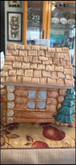 This is a Treasure Craft Log Cabin cookie jar