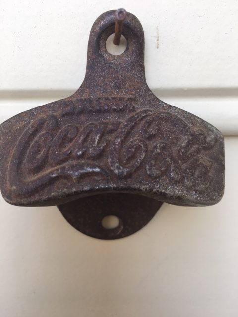 Antique Coca Cola bottle opener from the 50’s..