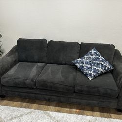 2 Living Spaces Grey couches 