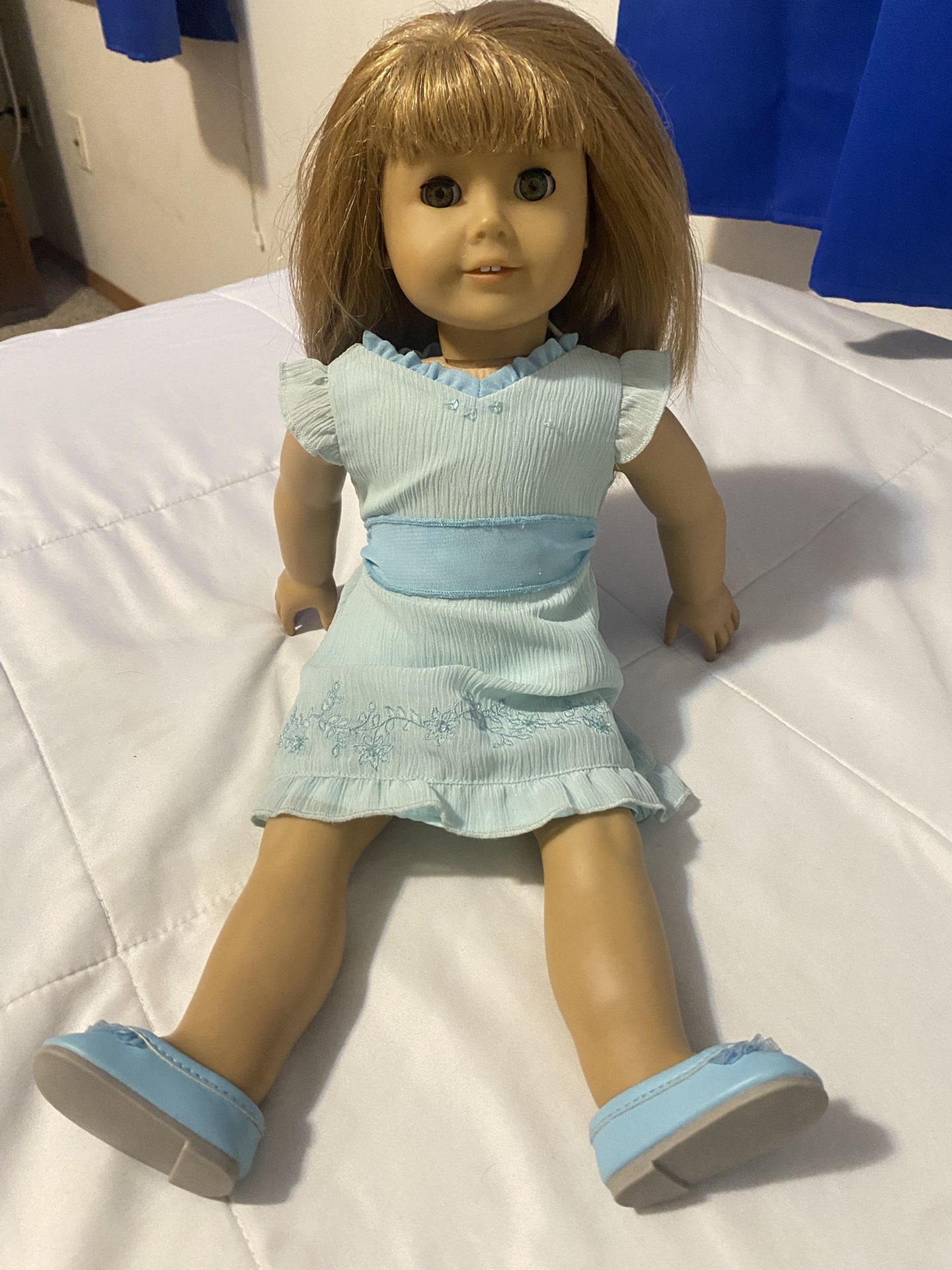 american girl doll with blue outfit