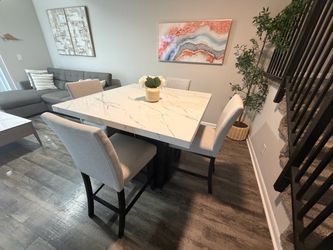 48 x 48 Calcutta dining room set / 4 chairs