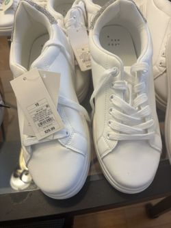 A NEW DAY . Woman Tennis. $ 4. Each , 2 For $ 7. Ontario City