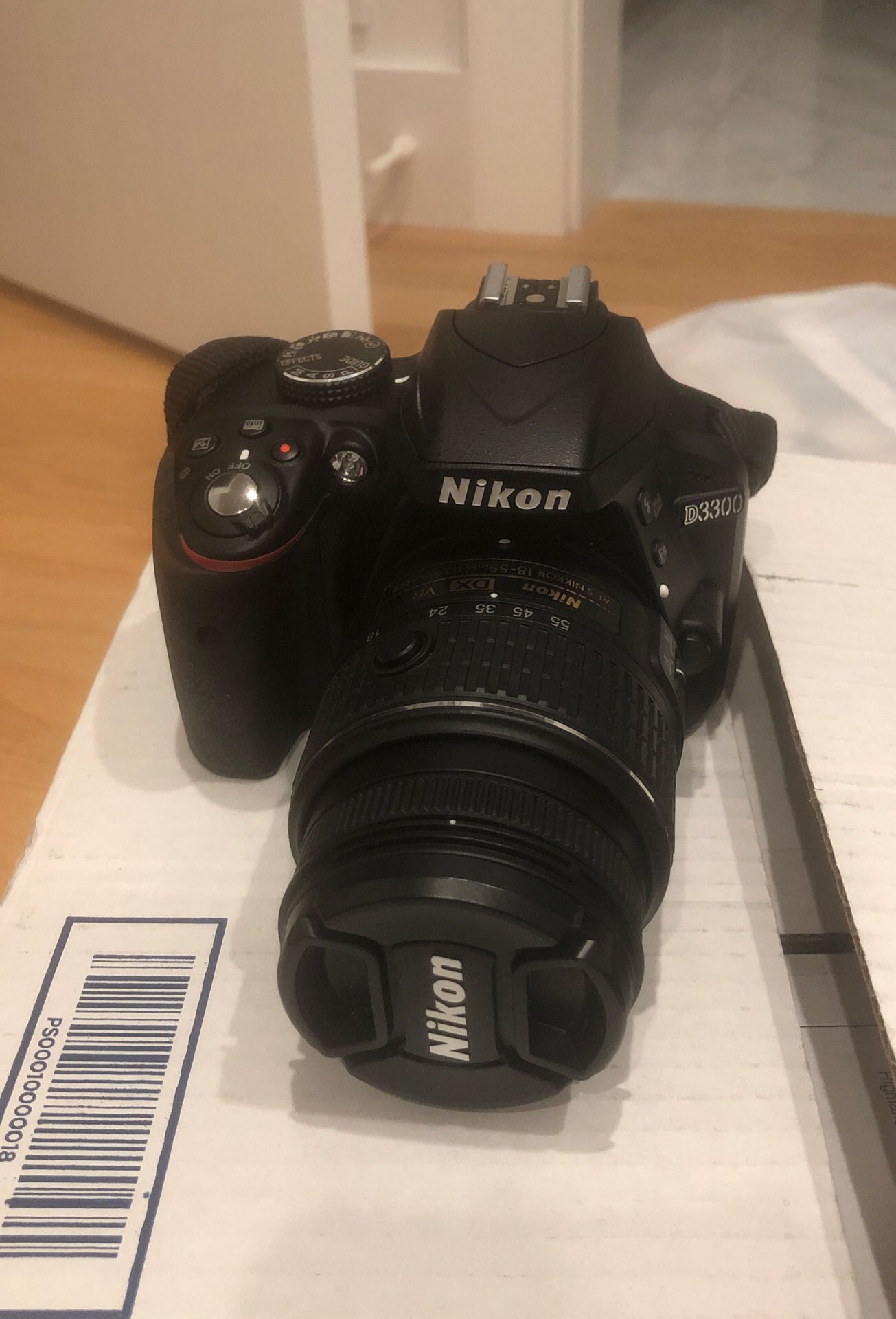 Nikon D3300 with charger/ battery and two lenses (18-55 and 55-200) and bag