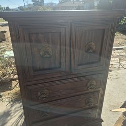 vintage dark wood armoire chest dresser cabinet appears to be from the Dixie Furniture Shangri La collection.