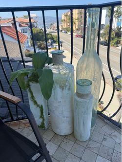4  large glass vases