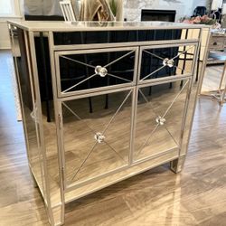Mirrored Cabinet New in Original Packaging With Stunning Crystal Knobs and Ample Storage Capacity.