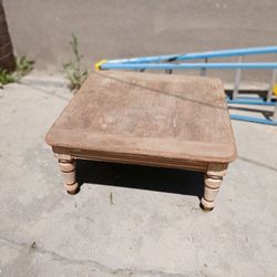 Heavy quality wood table low to ground