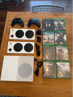 X-Box One with games and 2 regular and 2 adaptive controllers