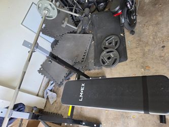 Bench, bar bell, two 25s two 10s