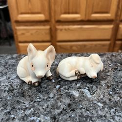 Vintage  Small Bisque Ceramic Pig Pair of  Salt and Pepper Shakers. Preowned.  Has been on display in a cabinet with a very large salt and pepper shak