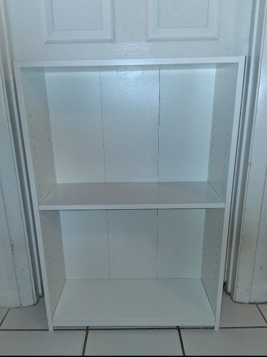 small 36"h 24 1/2"w 9 1/2"d white 2 shelf bookcase $15 FIRM