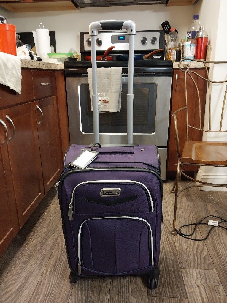 Coleman Soft side Spinner 21" Carry On luggage