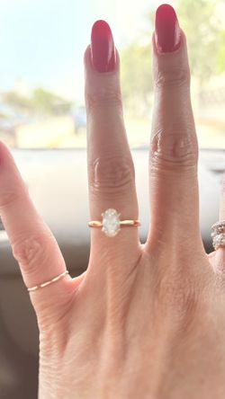 Engagement ring size 5 1/2  (1 carat diamond) oval cut 18 k gold