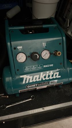Makita air compressor with  Air Hose Reel  250 firm