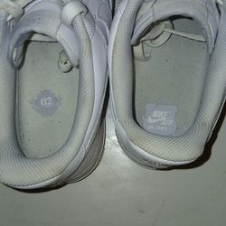 (Women's Nike Air Force Ones  size 9.5) with signs of used.  Worn 2-3 time