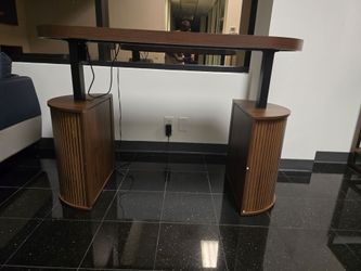 Automated height adjustable desk