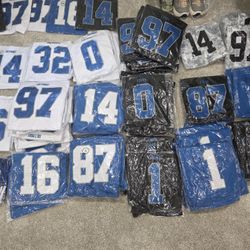 DETRIOT LIONS JERSEYS (**SEWN MATERIAL STRIPING/no Print Or Iron On )....All Sizes..