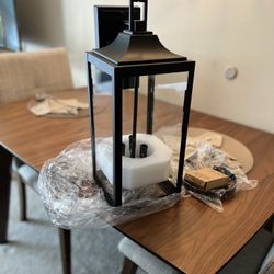 BRAND NEW EXTERIOR WALL LANTERN. BLACK. OLENTANGY RIVER RD AND BETHEL RD PICKUP.