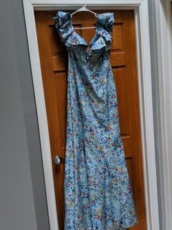 Brand new with tags floral mermaid gown. Size 12.