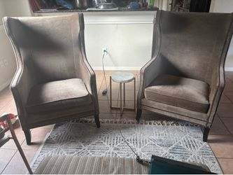 Two Velvet Winged Arm Chairs