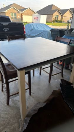 Kitchen table counter high, three chairs $75