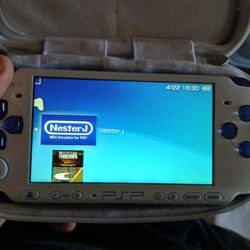 PSP WITH CASE, CHARGER, 100'S OF  GAMES , LOCSL PICKUP ONLY, THANKS
