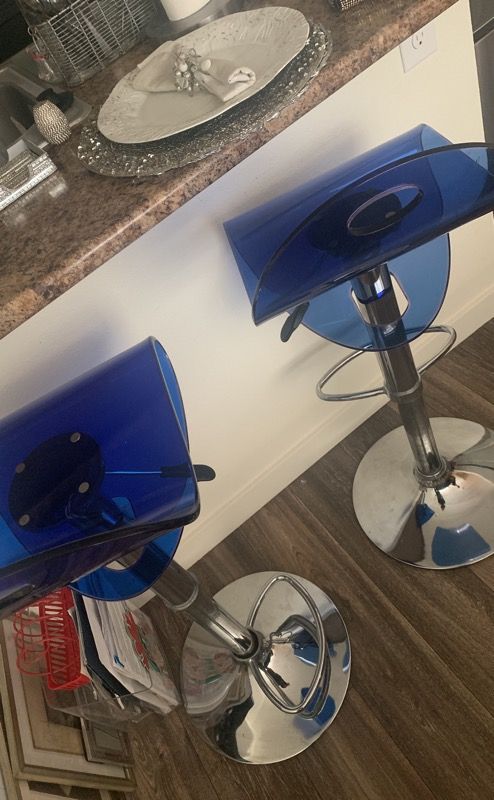 Two blue bar stools